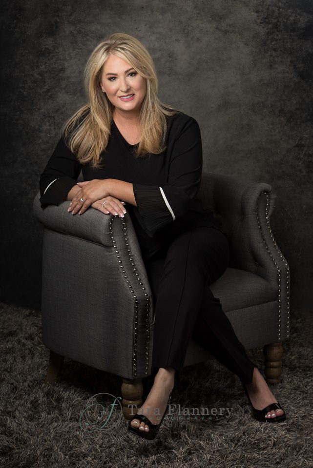 Portrait photography woman in chair realtor