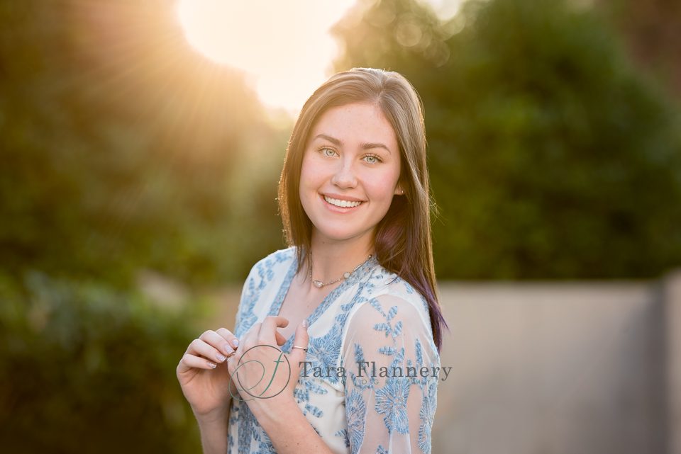 senior girl outdoor backlit portrait