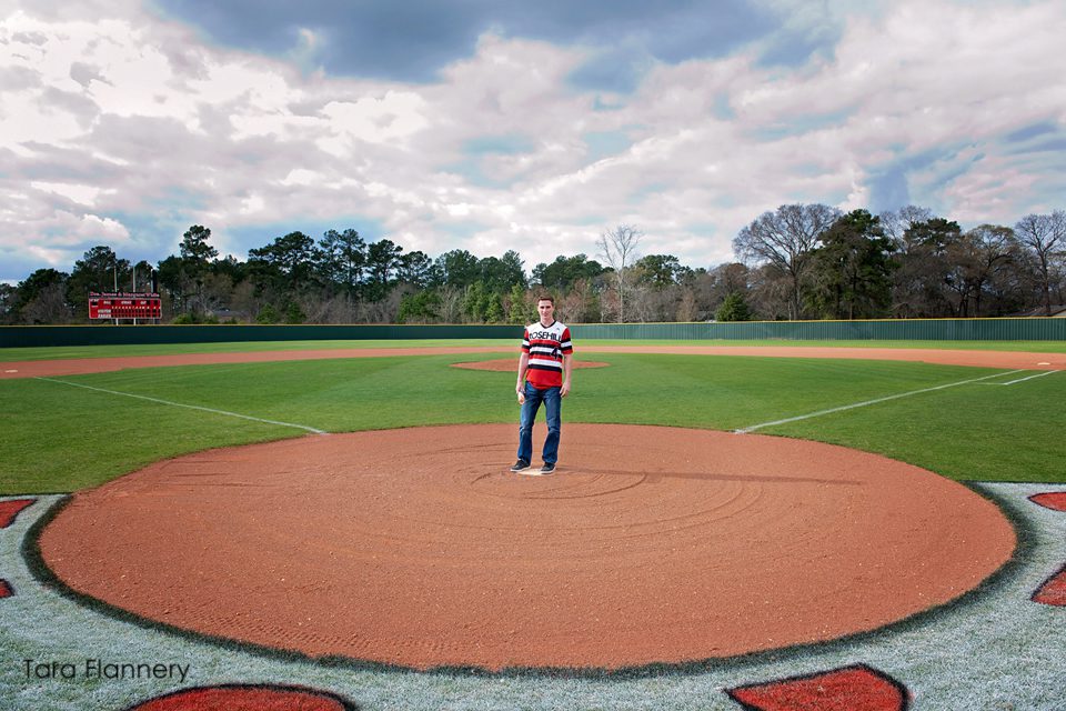 High School Senior Boy on baseball field