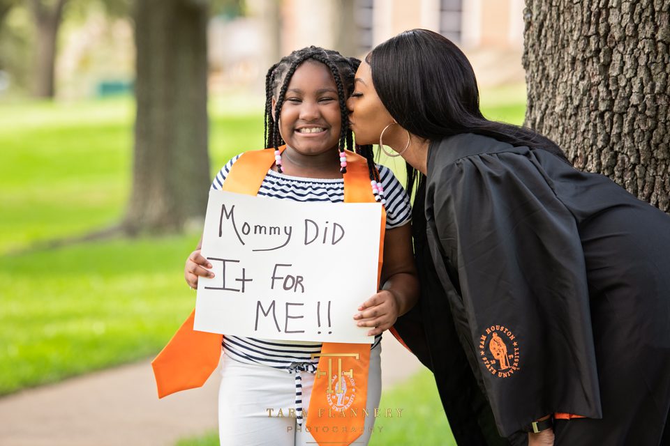 College graduate with her daughter