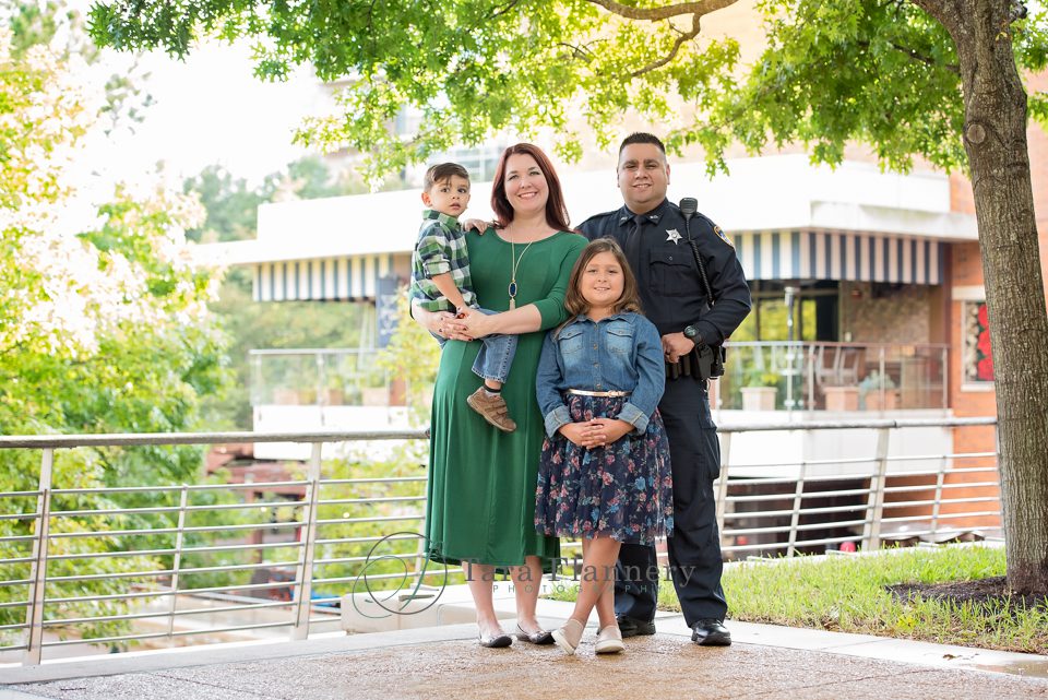 Giving Back to Community family portrait with police officer