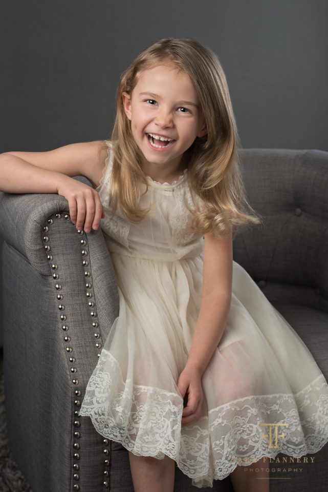 5 year old little girl in white dress portrait