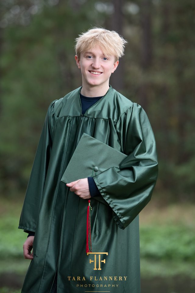 senior The Woodlands with cap and gown