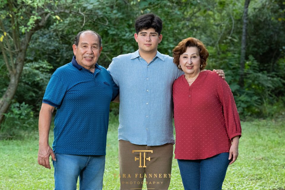 Seniors can include their family in some photos during their senior portrait session.