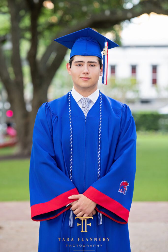 High school senior in cap & gown.
