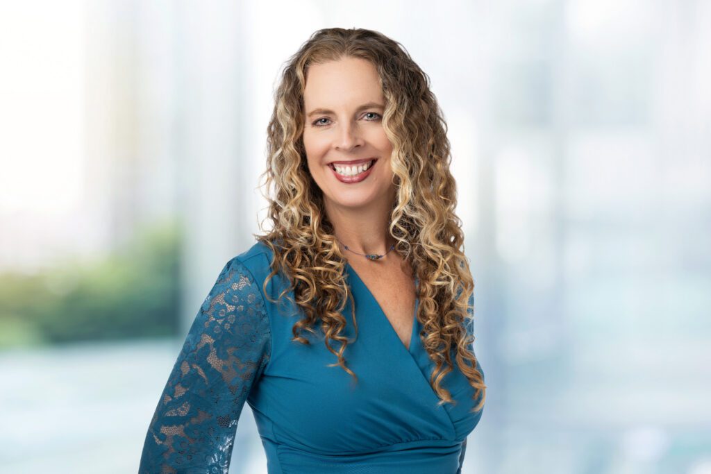Do I smile in a professional headshot?