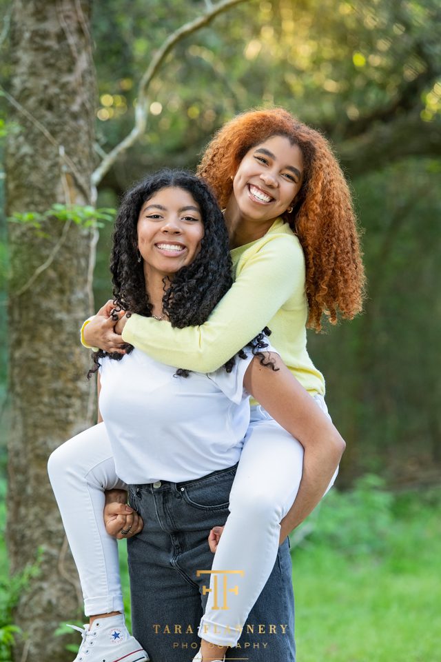 sisters having fun during family portrait session