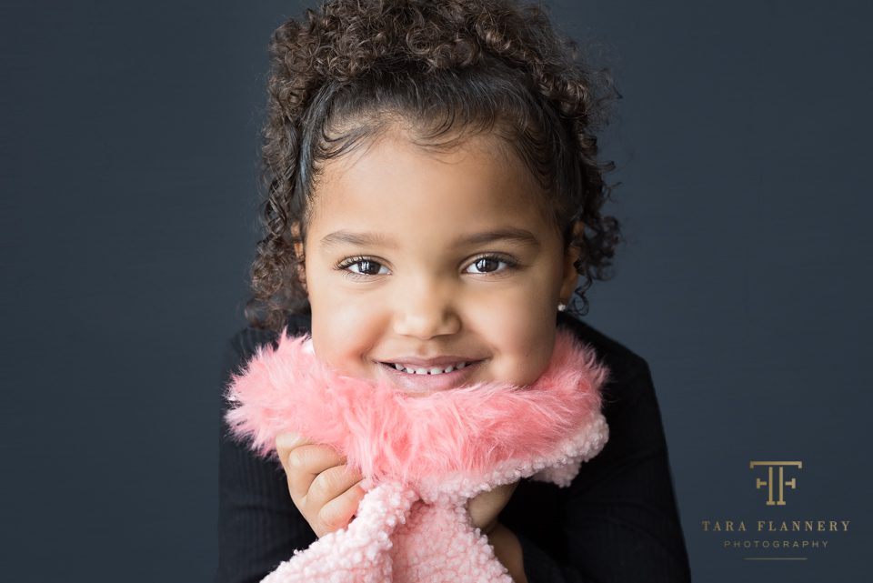 little girl with pink furry jacket model pageant