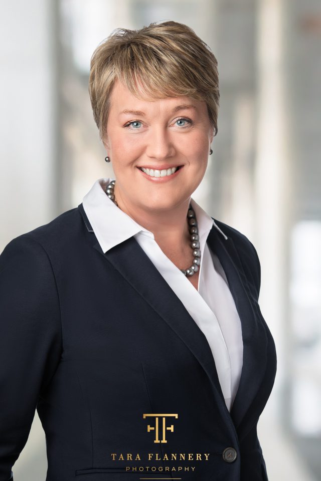 professional headshot woman in suit