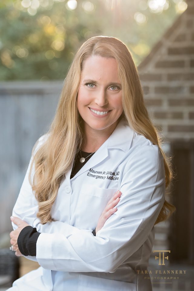 female physician headshot outdoors