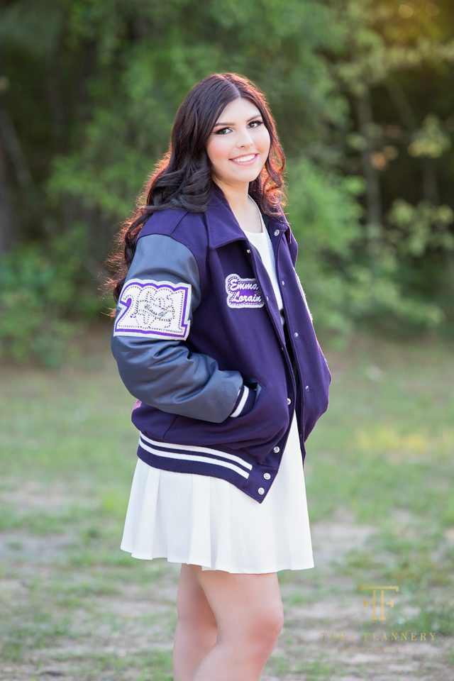 high school senior with letter jacket