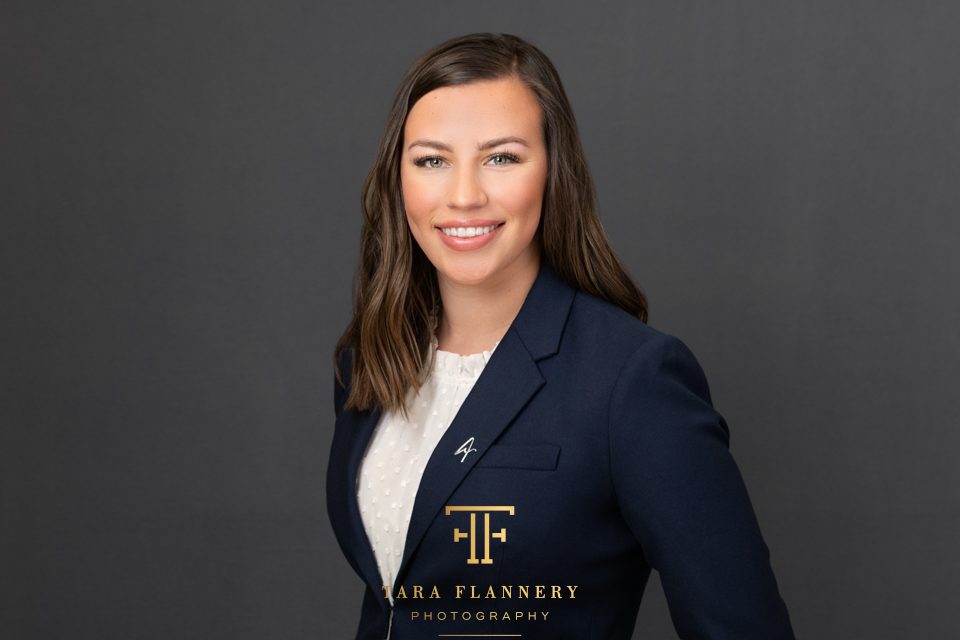woman's professional headshot in blue suit