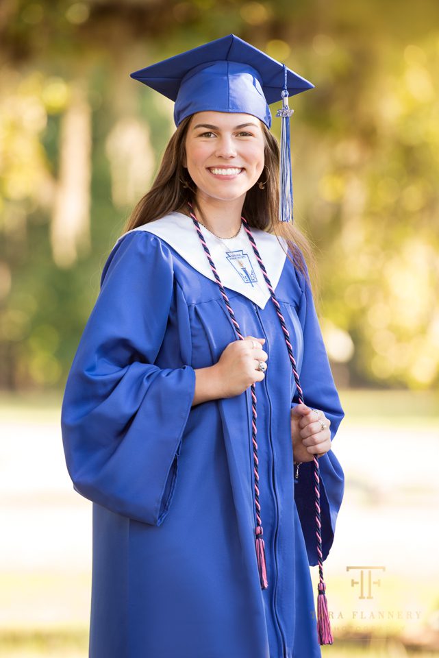 high school graduate in cap and gown