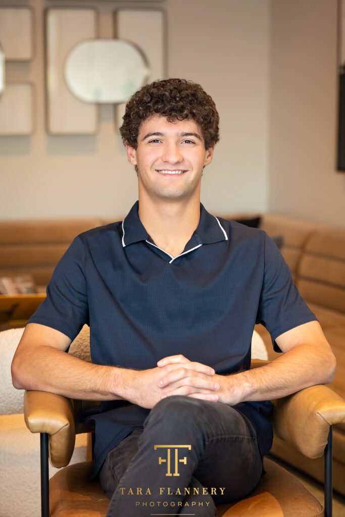 Young race car driver poses for an athlete branding image.