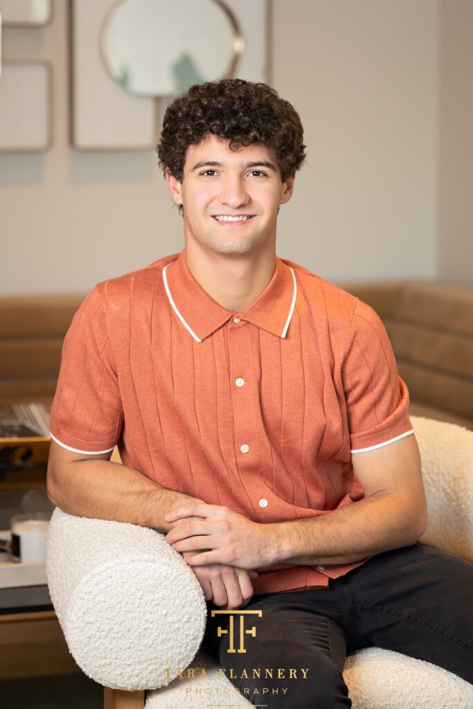 Young race car driver poses for a branding image.